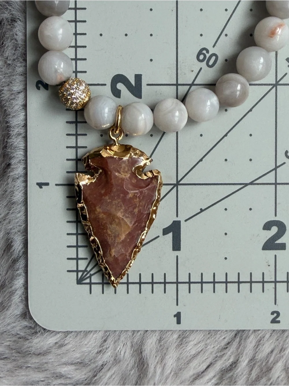 Semi-Precious White Beaded Bracelet with Gold-Edged Arrowhead Gemstone Charm
